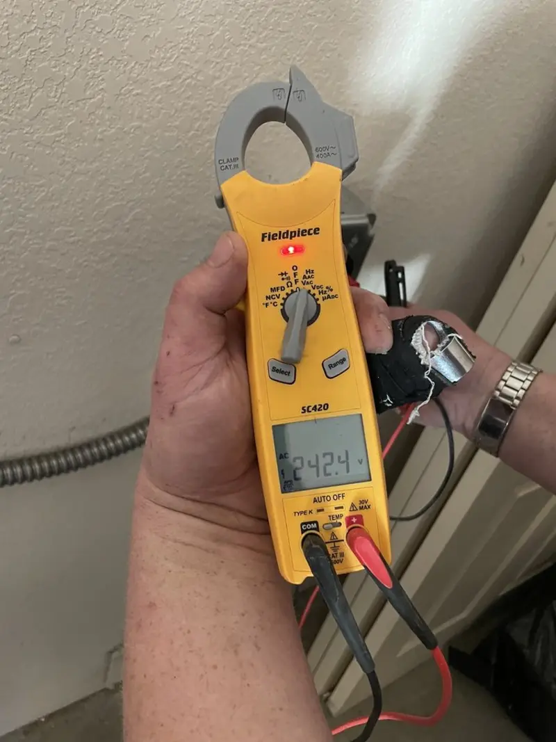 Voltage testing with clamp meter during Aluminum Wiring Replacement in Athol